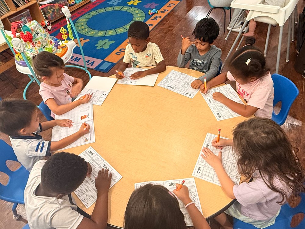 Children working together at a table